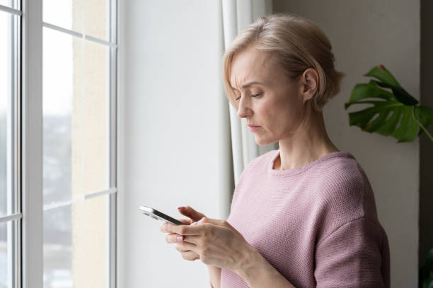 Person booking IV drip on phone